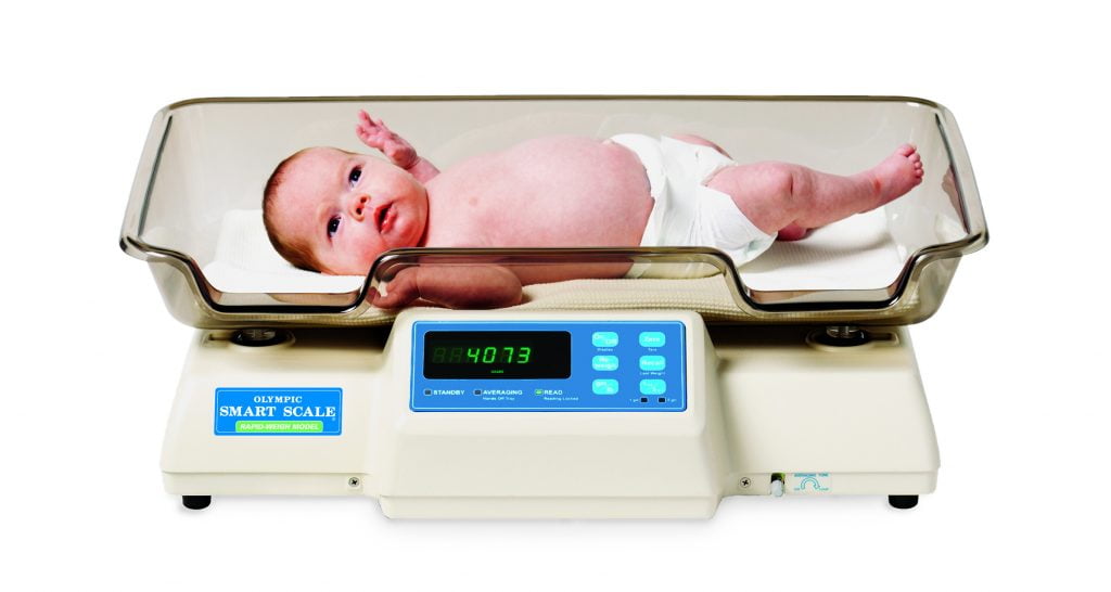 Baby on weighing scale | Average Weight of Newborn baby