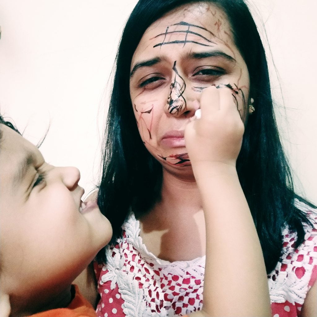 Real Mom Manali Tiwari - son scribbling on her face