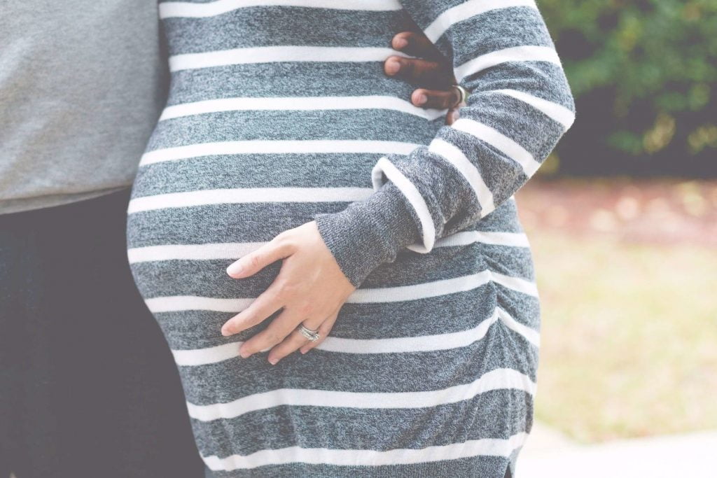 Maternity Insurance during pregnancy - man and pregnant woman
