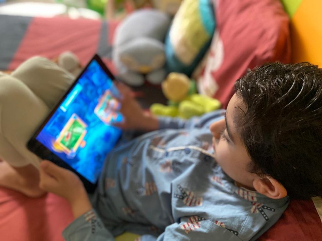 Educational Games for Kids - A boy using BYJUs app on the iPad