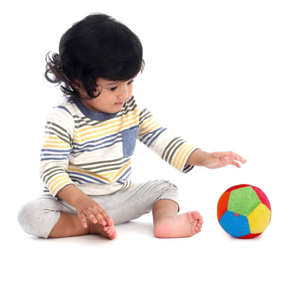 Child playing with Indian toy brand