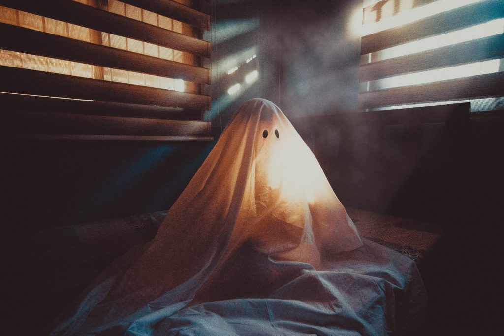 Halloween Movies - Child hidden under the sheet