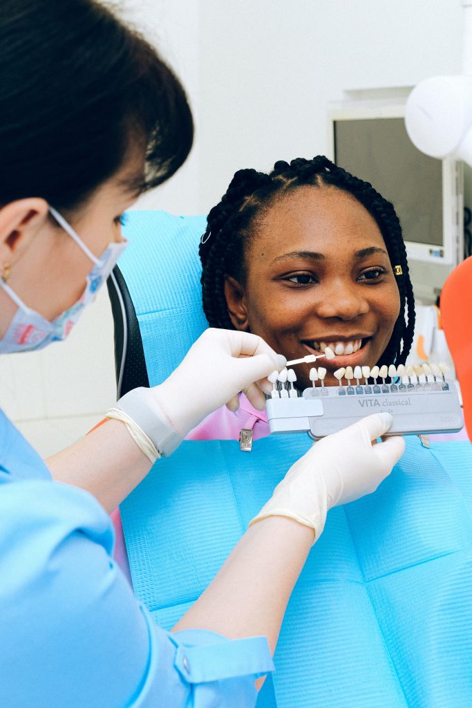 Broken tooth - Woman checking dental implants