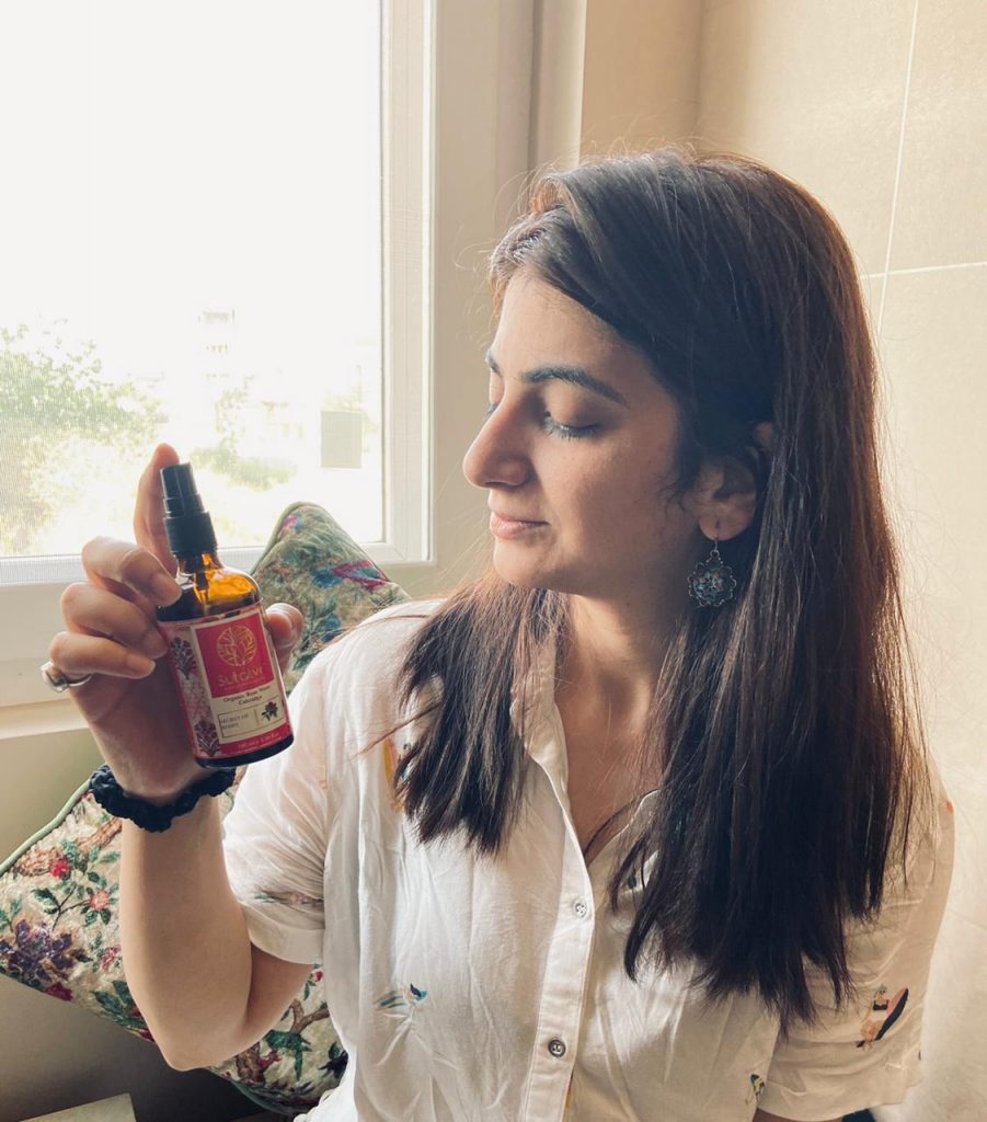 Skin care at home - Woman applying rose water