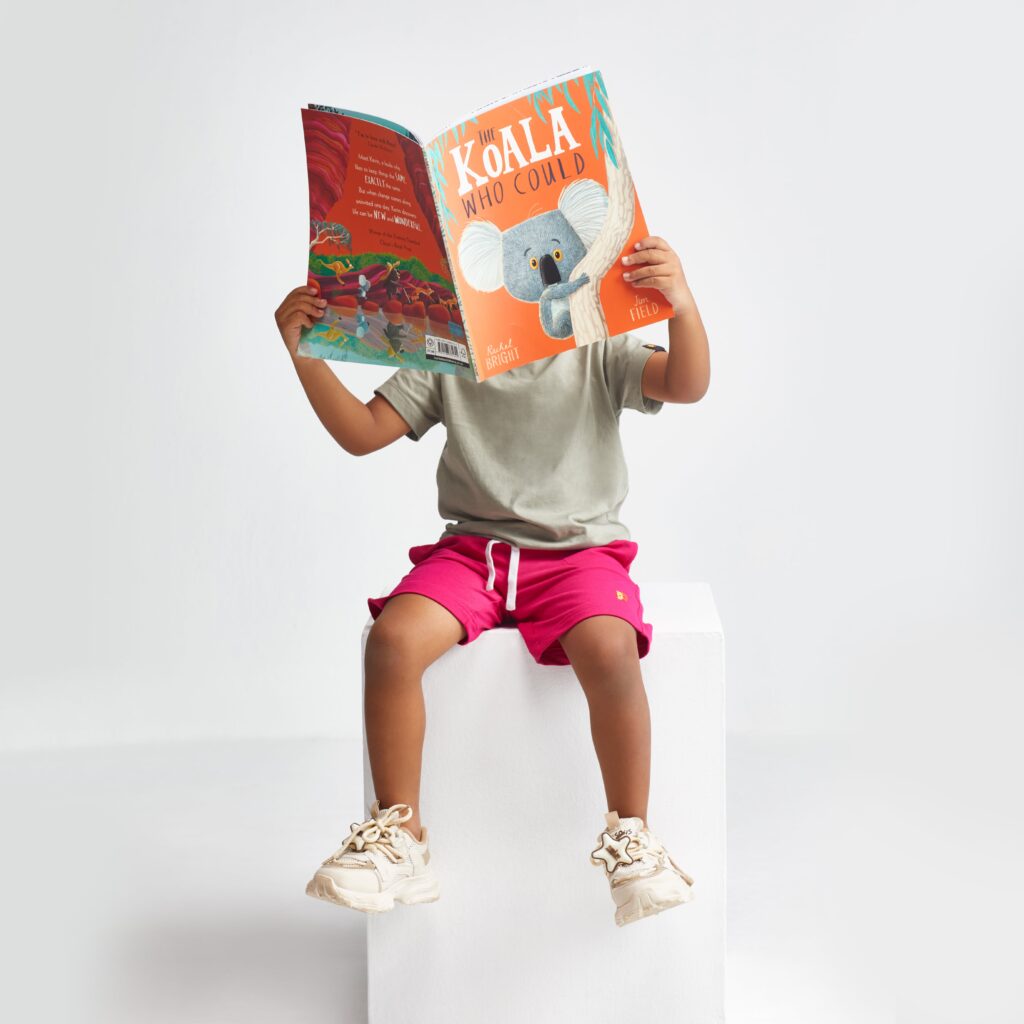 Kiggle Boy reading book